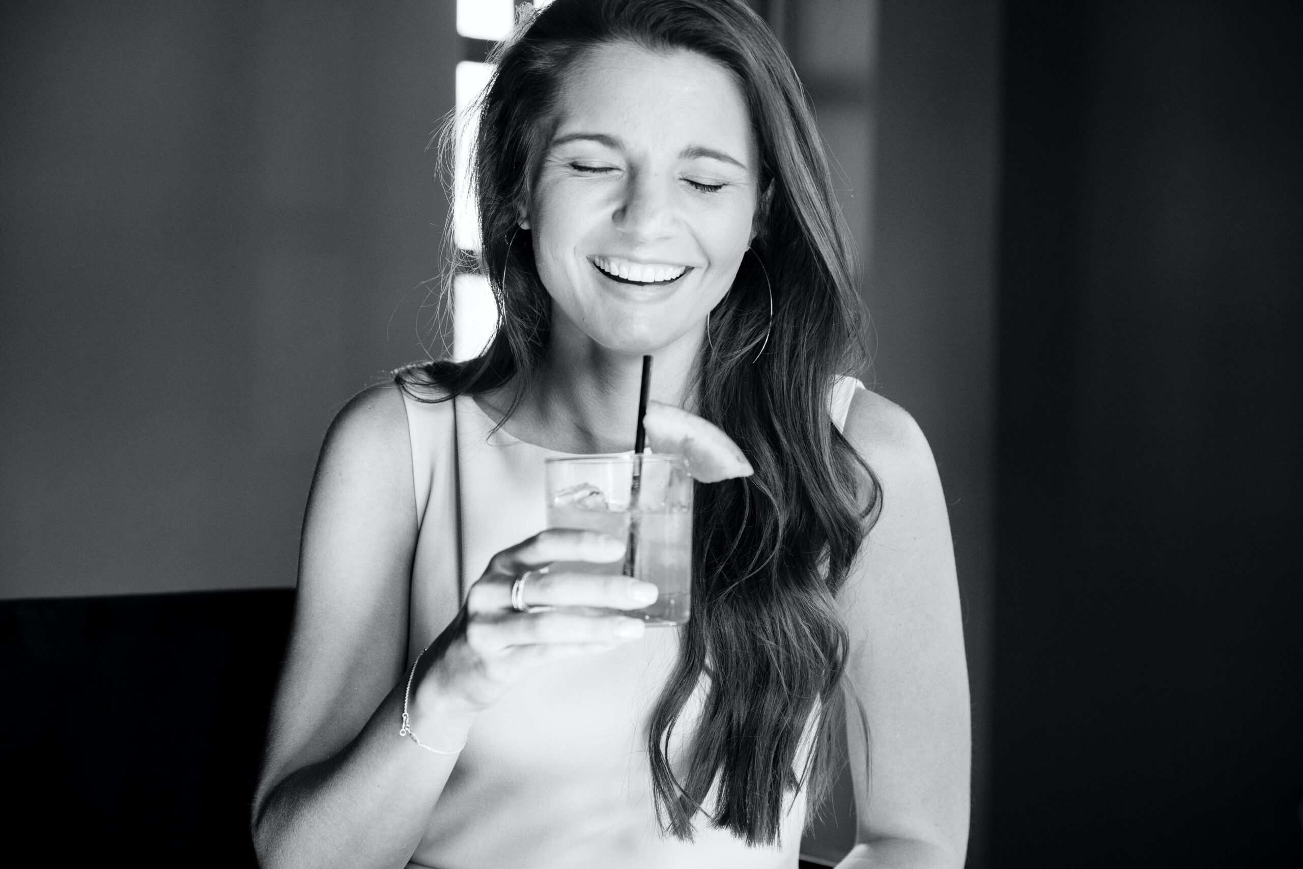 Athlete in Bangkok drinking Kombucha Bangkok after a workout for recovery and energy boost.